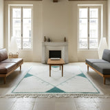 Ivory Aqua Diamond Beni Ourain Style Wool Rug styled in a bright living room