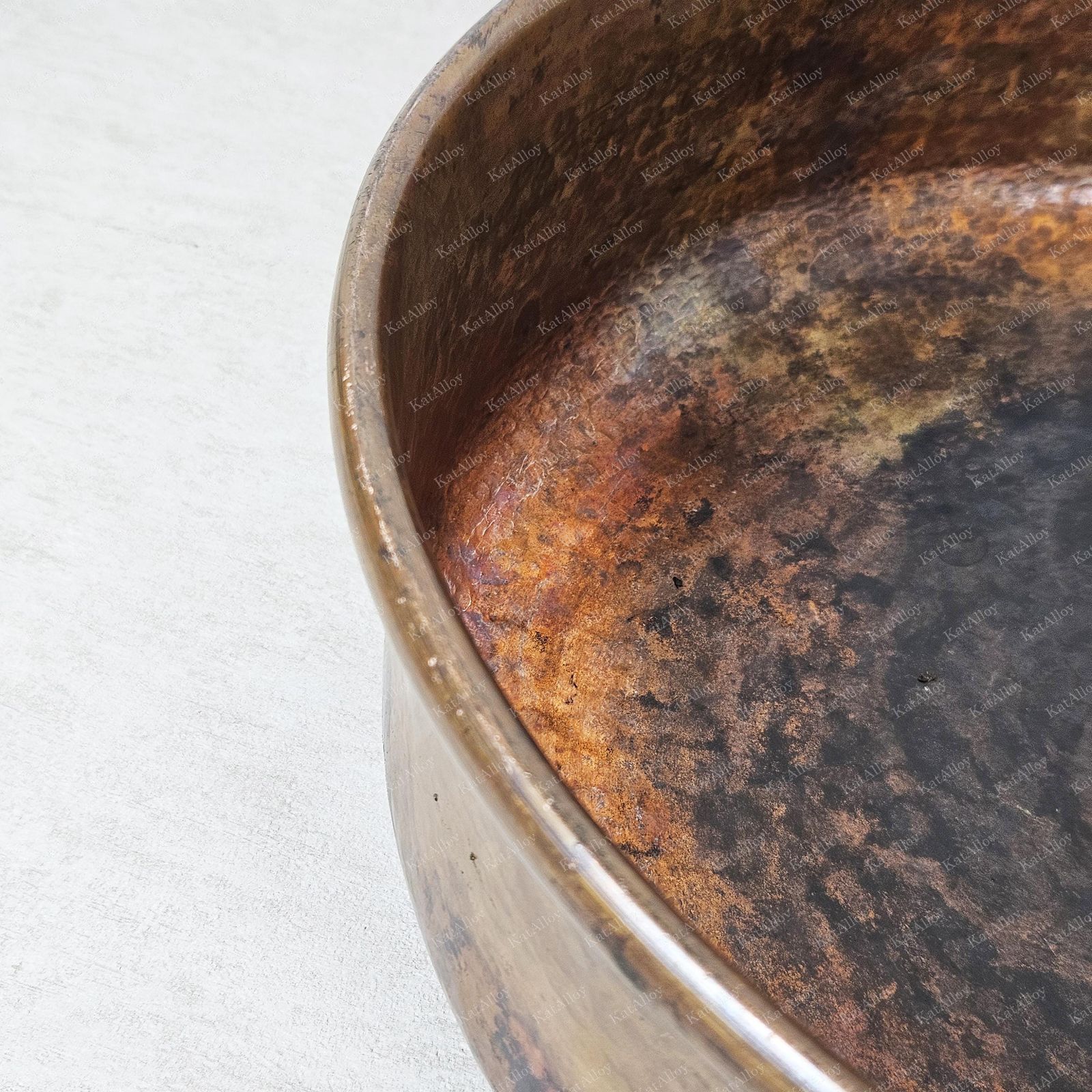 Close-up of a rusty metal surface on a white background