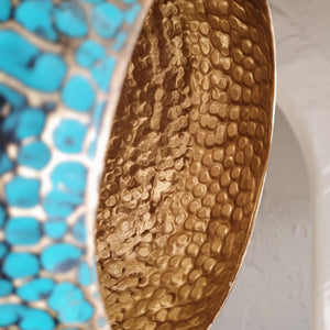 Close-up of a textured gold and blue object