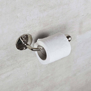Silver toilet paper holder with a roll of toilet paper on a light gray background