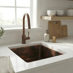 Modern kitchen with a copper sink and faucet