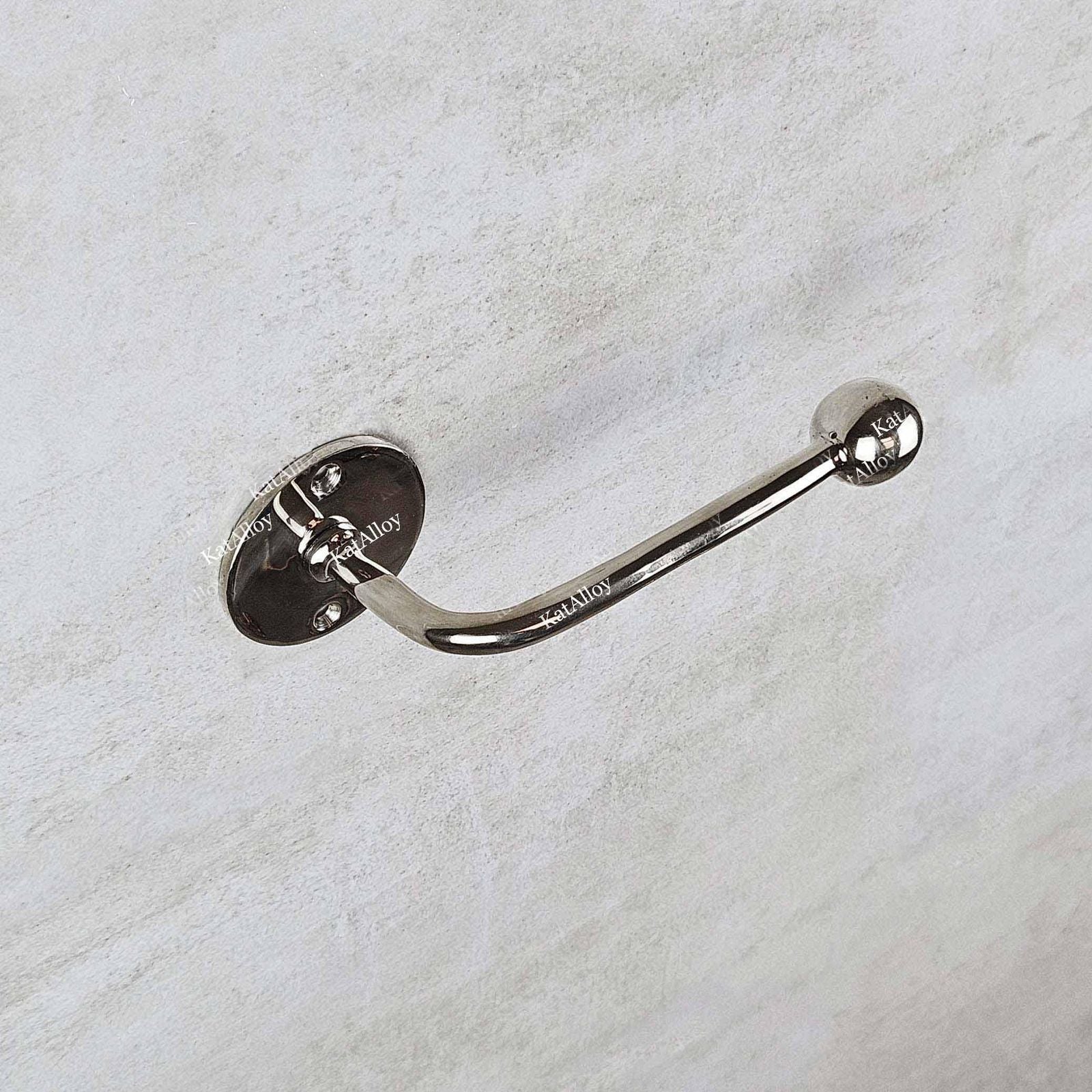 Chrome hook on a white towel background