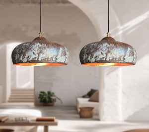 Two rustic pendant lights hanging in a modern living room.