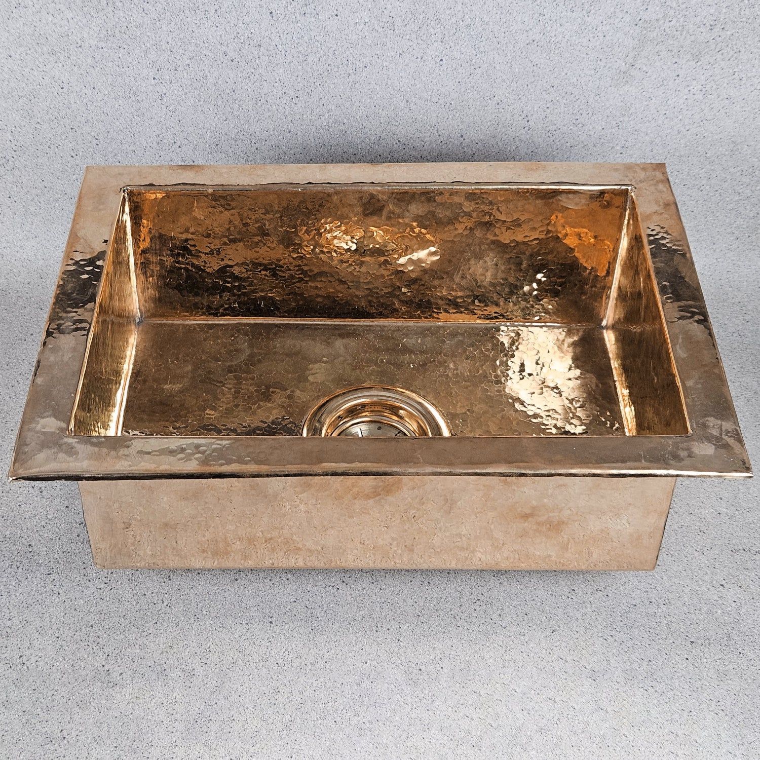 Bronze sink on a gray background