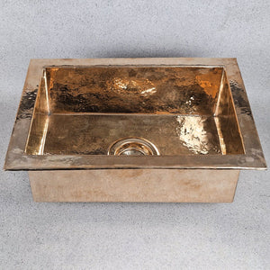 Bronze sink on a gray background