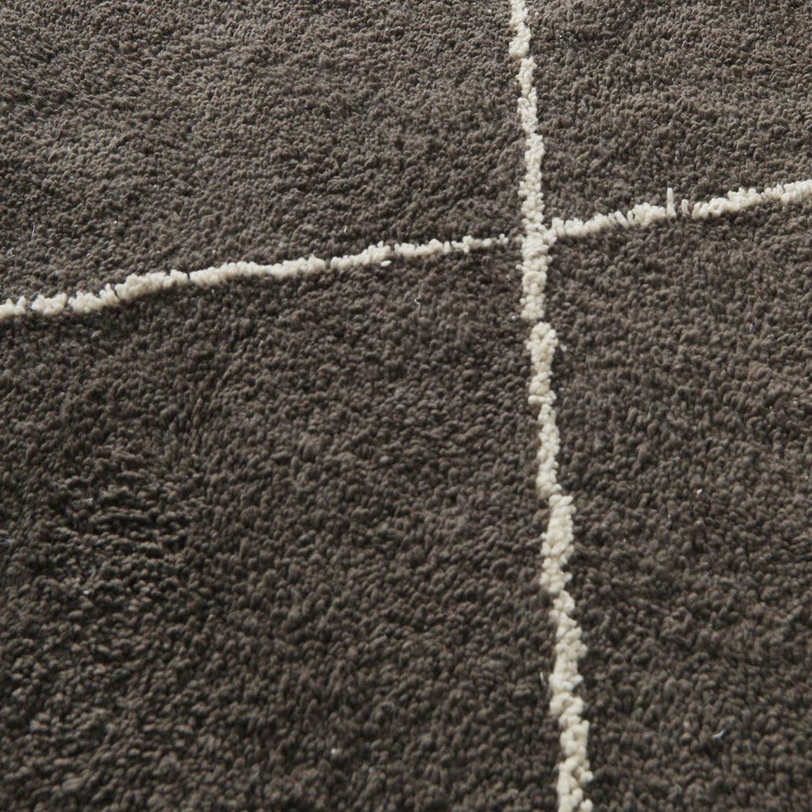 Full view of charcoal and ivory diamond lattice Moroccan wool rug