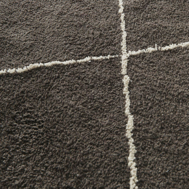 Full view of charcoal and ivory diamond lattice Moroccan wool rug