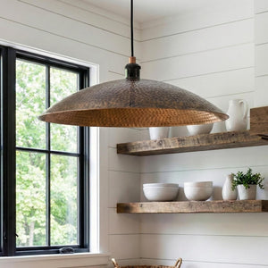 Kitchen with wooden pendant light and shelves, featuring a window and natural light.