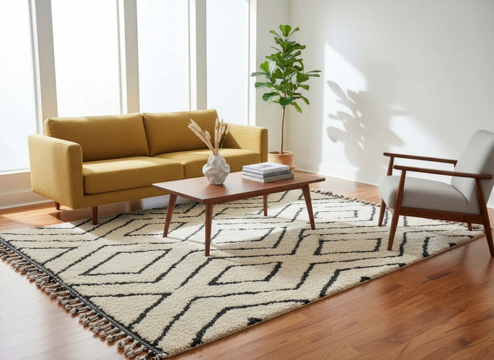 Ivory Black Maze Geometric Moroccan Wool Rug styled in a bright living room