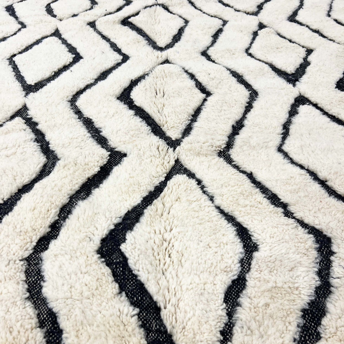 Maze Geometric detail on a handmade Moroccan wool rug