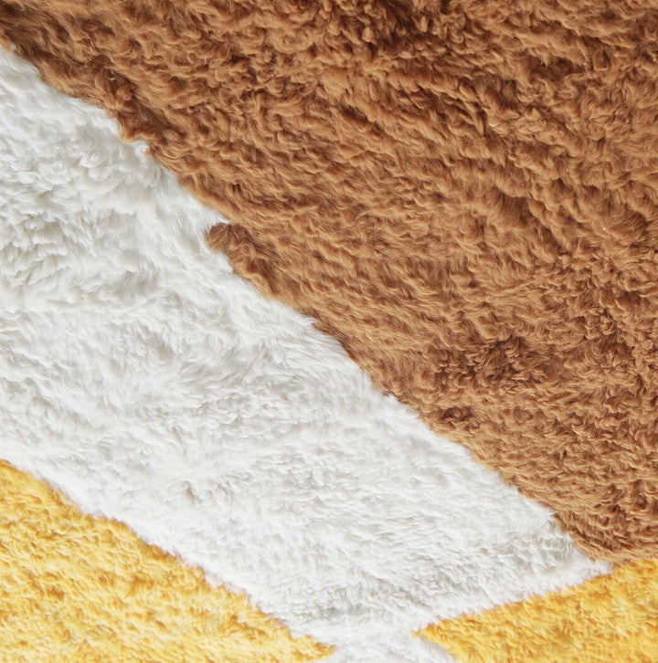 Full view of mustard and brown color block Moroccan wool rug