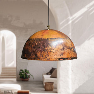 Vintage-style pendant light hanging in a modern interior setting